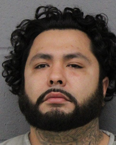 Lewis Uris Martinez was arrested in connections to street disturbances in Austin that included blocked intersections and fires.