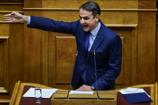 Leader of Greece's main opposition New Democracy party Kyriakos Mitsotakis gestures in parliament ahead of a weekend censure vote against the government in a bid to block a proposed name deal with Macedonia