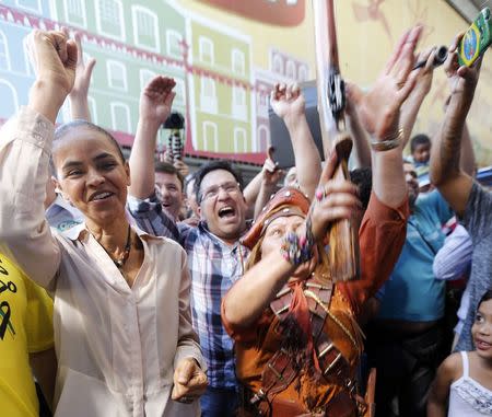 Brazil's Socialist Party presidential candidate Marina Silva (L) attends a campaign rally in Sao Paulo August 24, 2014. REUTERS/Paulo Whitaker