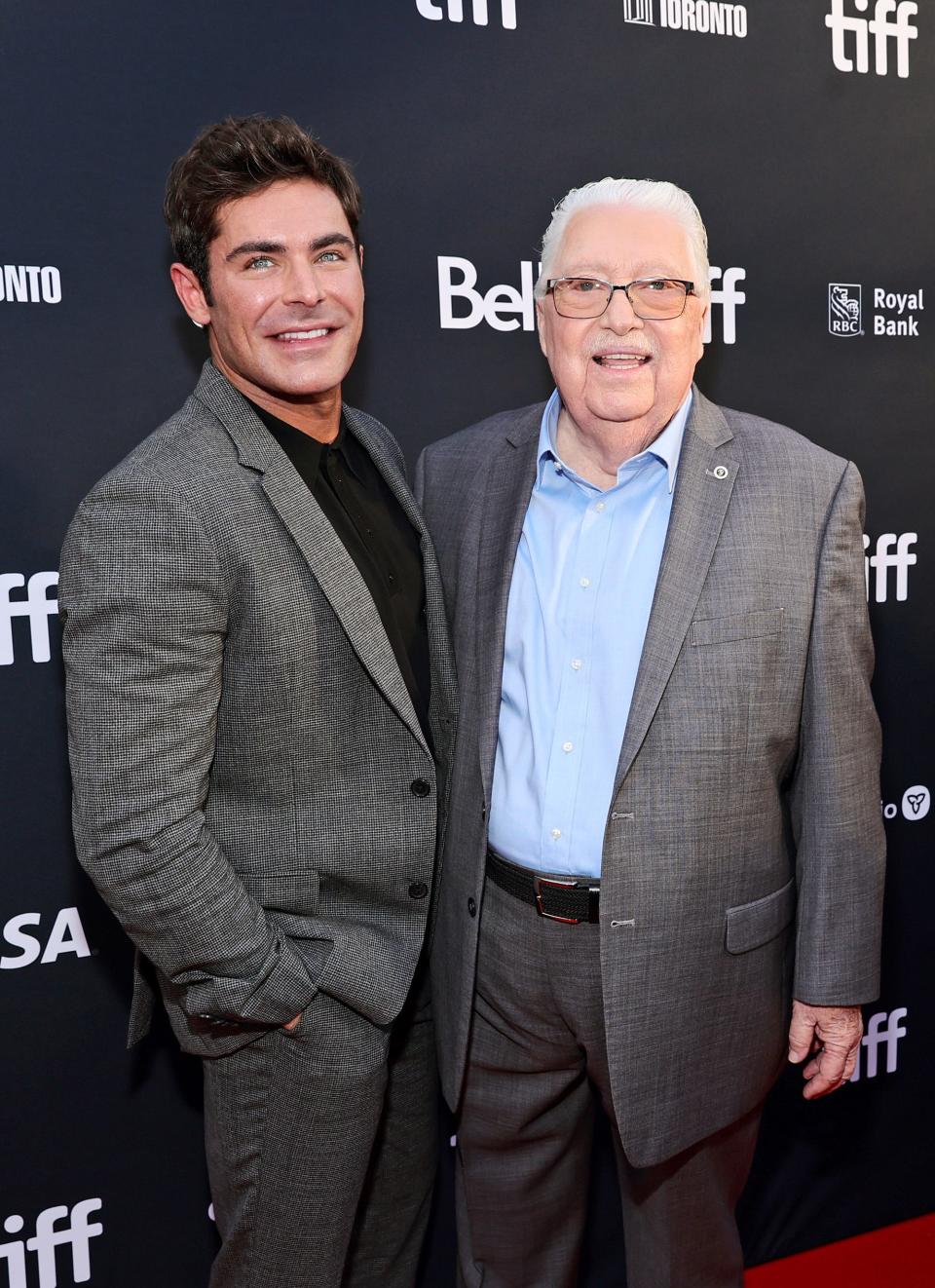 Zac Efron (left) and John "Chickie" Donohue attend "The Greatest Beer Run Ever" premiere at the 2022 Toronto International Film Festival.