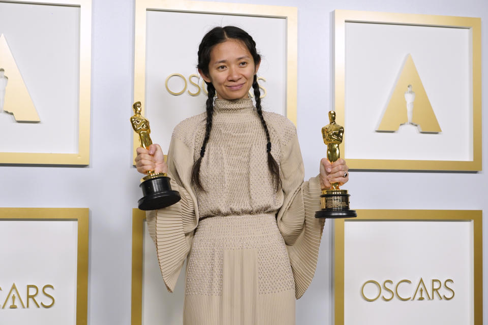 Chloe Zhao, winner of the awards for best picture and director for "Nomadland," poses in the press room at the Oscars on Sunday, April 25, 2021, at Union Station in Los Angeles. (AP Photo/Chris Pizzello, Pool)