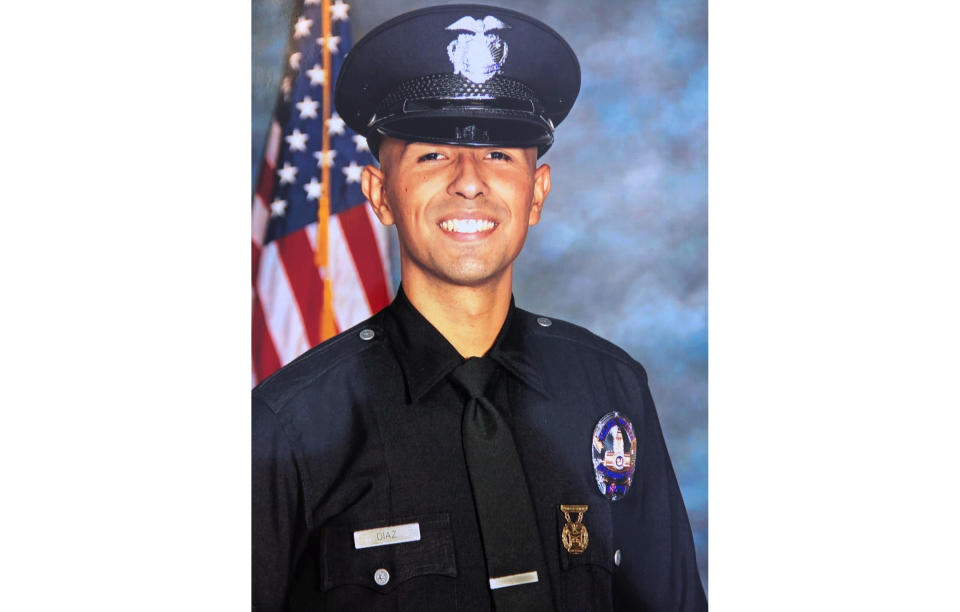FILE - This image released by Los Angeles Police Department shows officer Juan Diaz. The primary suspect in the fatal shooting of the off-duty Los Angeles police officer was arrested early Friday, Aug. 2, a person briefed on the investigation told The Associated Press. (Los Angeles Police Department via AP,File)