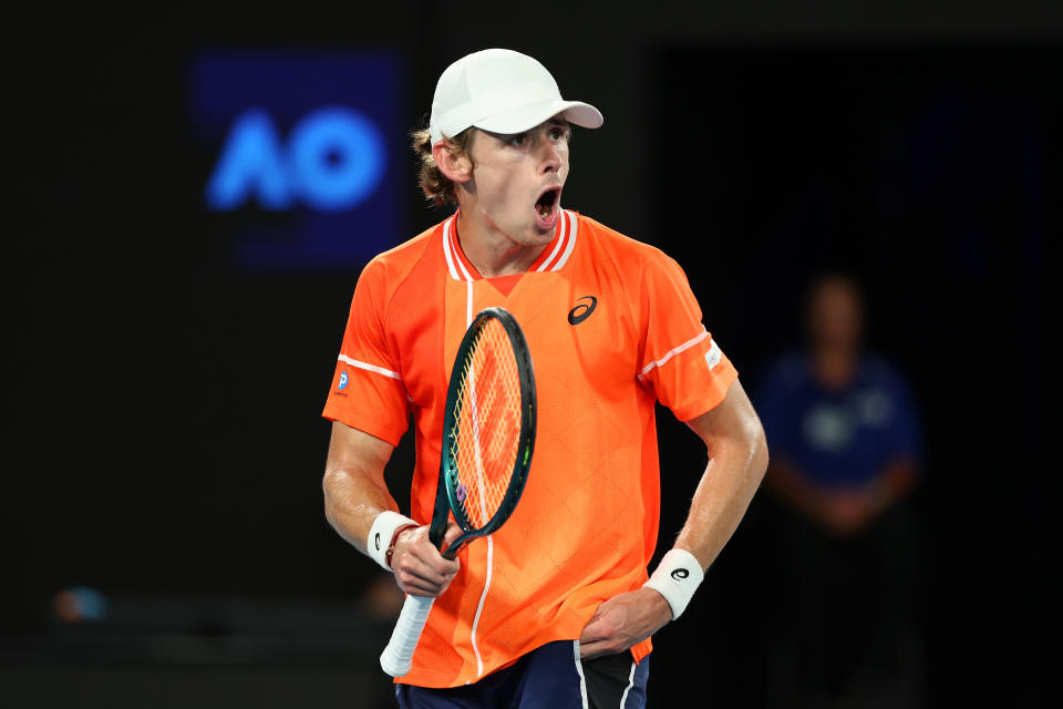 Alex de Minaur celebrates.