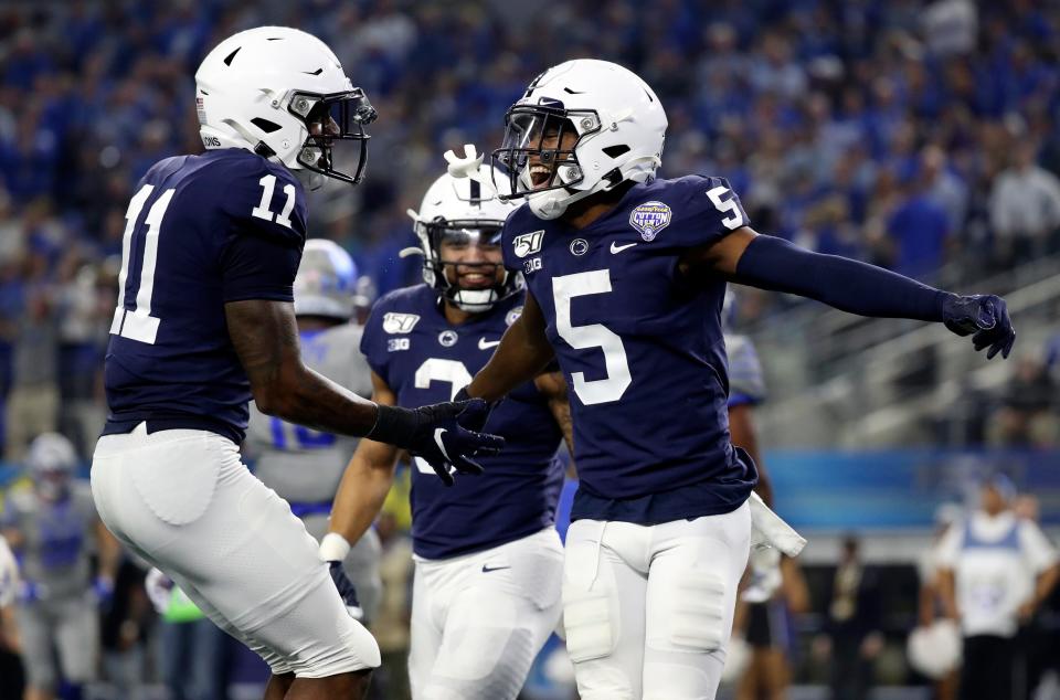 Penn State Nittany WR Jahan Dotson (5) could very well come off the board in Round 1 of the 2022 NFL draft.