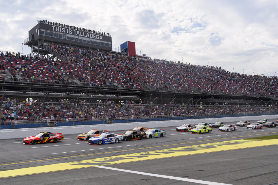 Justin Allgaier (7) leads the start of a NASCAR Xfinity Series auto race Saturday, Oct. 2, 2021, in Talladega, Ala. (AP Photo/John Amis)