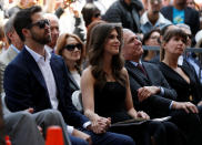 <p>James and Jessica Altman watch their mother actor Lynda Carter (not pictured) before the unveiling of her star on the Hollywood Walk of Fame in Los Angeles, California, U.S., April 3, 2018. REUTERS/Mario Anzuoni </p>