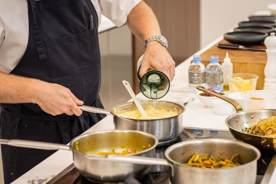 Chef William Dissen prepared grits, fried chicken and other Southern dishes for guests in Doha, Qatar during a culinary diplomacy trip, Nov. 23-29, 2021.