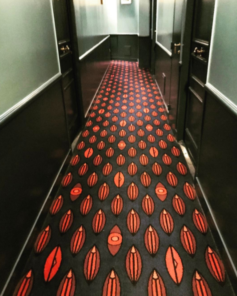 The hotel's risque carpet is a defining feature, showing off customised artwork by André and Pierre Frey.