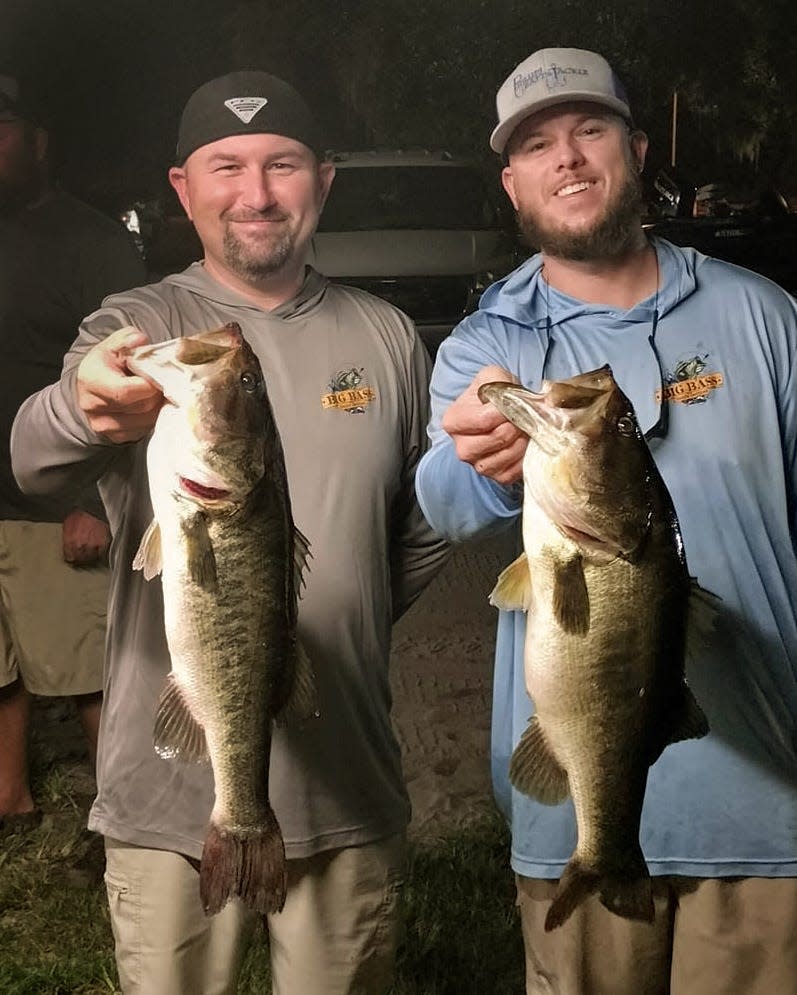 Danny Glisson, left, and Daniel Smith had 14.12 pounds and also big bass with a 6.06 pounder to win first place during the Thursday Night Open Series tournament Sept. 22 on the Winter Haven North Chain. 