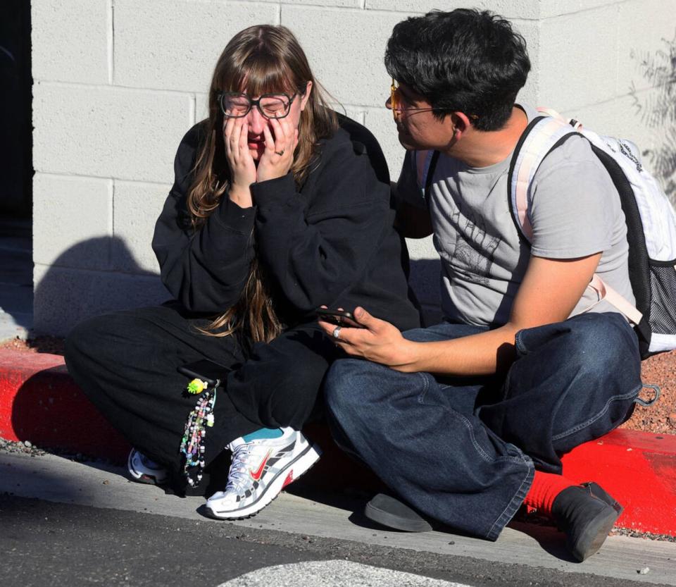 PHOTO: Amanda Perez is comforted by fellow student Alejandro Barron near Maryland Parkway following a shooting on the UNLV campus in Las Vegas, Dec. 6, 2023. (K.M. Cannon/Las Vegas Review-Journal/Tribune News Service via Getty Images)