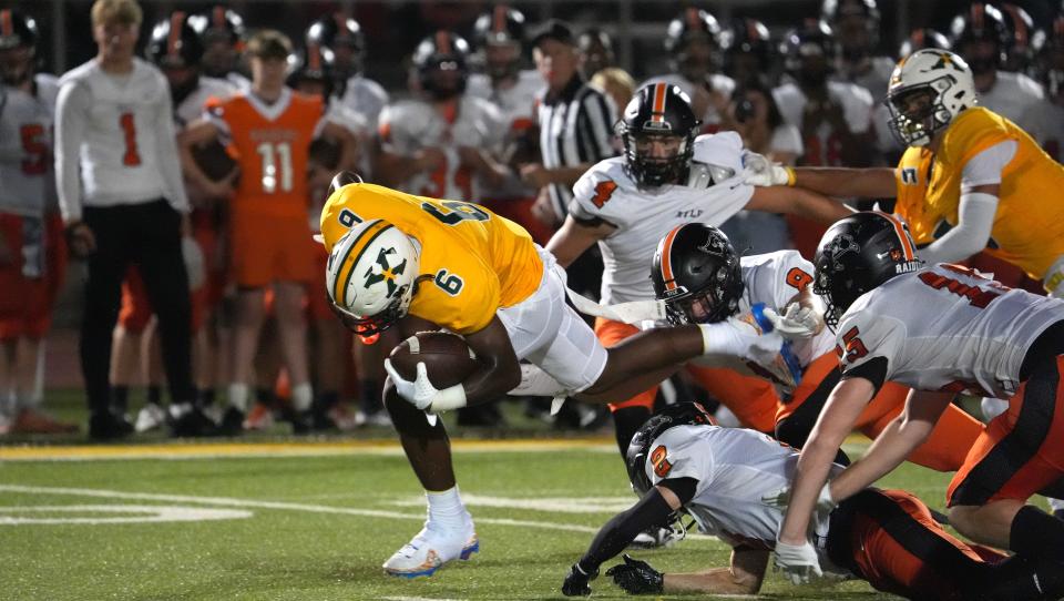 St. X’s Marlon Harbin ran the ball in for a touchdown against Ryle on Friday night.