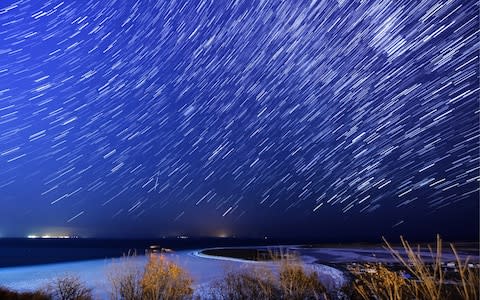 The Geminids meteor shower in Vladivostok, Russia in December 2017 - Credit: Yuri Smityuk