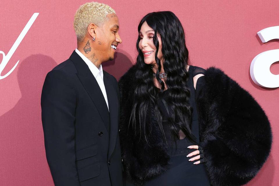 <p>Max Cisotti/Dave Benett/Getty</p> Alexander Edwards (L) and Cher attend the amfAR Cannes Gala 30th edition presented by Chopard And Red Sea International Film Festival at Hotel du Cap-Eden-Roc on May 23, 2024 in Cap d