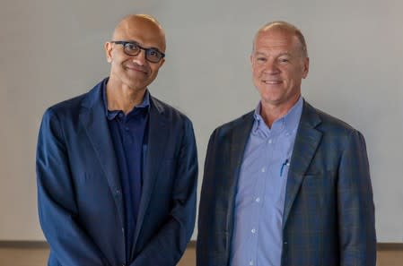 Handout photo of Satya Nadella, CEO, Microsoft Corporation and John Donovan, CEO, AT&T Communications pose in Redmond, Washington