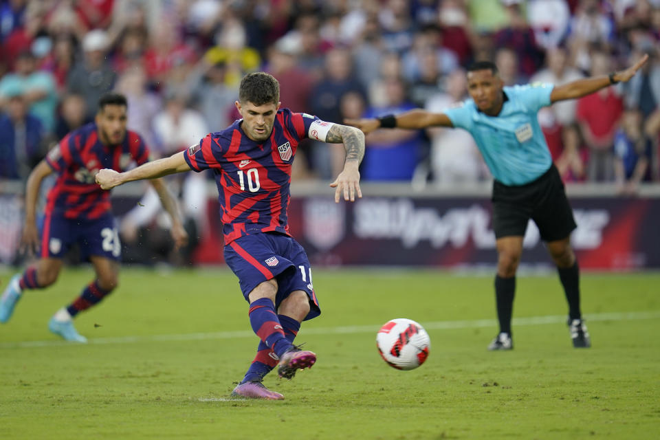 United States' Christian Pulisic (10) kicks a goal on a penalty kick against Panama during the first half of a FIFA World Cup qualifying soccer match, Sunday, March 27, 2022, in Orlando, Fla. (AP Photo/Julio Cortez)