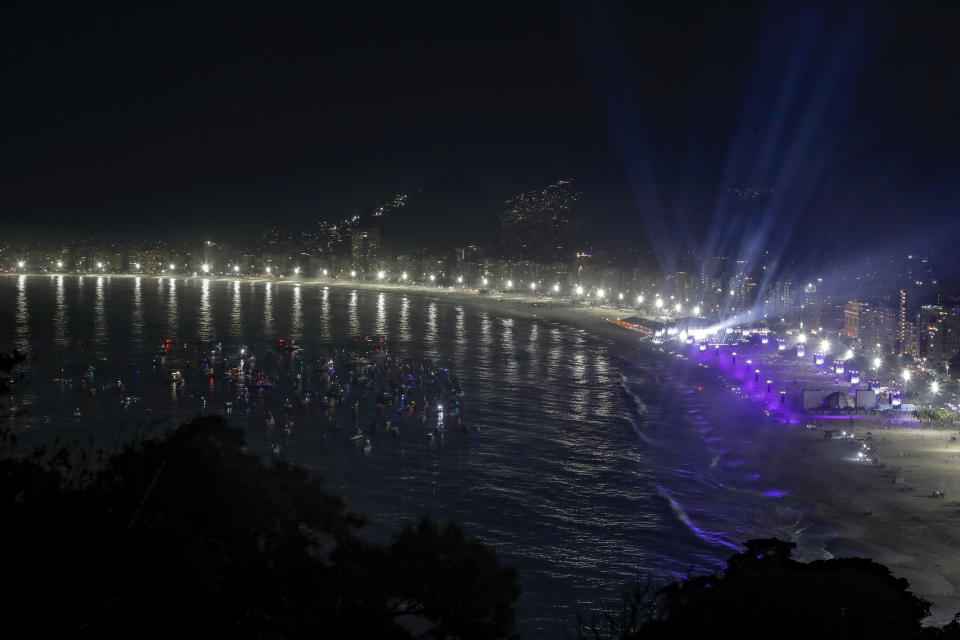 Boats sit idle off Copacabana beach as fans watch Madonna's final show of her The Celebration Tour in Rio de Janeiro, Brazil, on Saturday, May 4, 2024 (AP Photo/Bruna Prado)