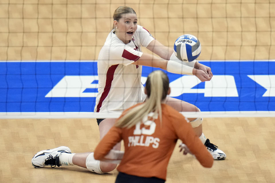 Wisconsin's Sarah Franklin (13) plays a serve against Texas during a semifinal match in the NCAA Division I women's college volleyball tournament Thursday, Dec. 14, 2023, in Tampa, Fla. (AP Photo/Chris O'Meara)