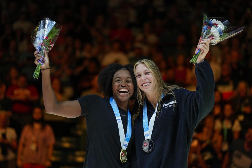 Simone Manuel and Gretchen Walsh celebrate after the Women's 50 freestyle finals Sunday, June 23, 2024, at the US Swimming Olympic Trials in Indianapolis. (AP Photo/Michael Conroy)