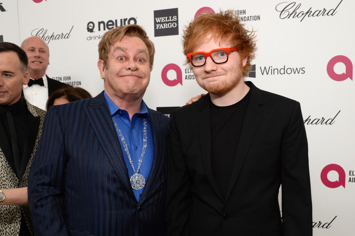 WEST HOLLYWOOD, CA - MARCH 02:  Sir Elton John (L) recording artist Ed Sheeran attend the 22nd Annual Elton John AIDS Foundation Academy Awards Viewing Party at The City of West Hollywood Park on March 2, 2014 in West Hollywood, California.  (Photo by Michael Kovac/Getty Images for EJAF)