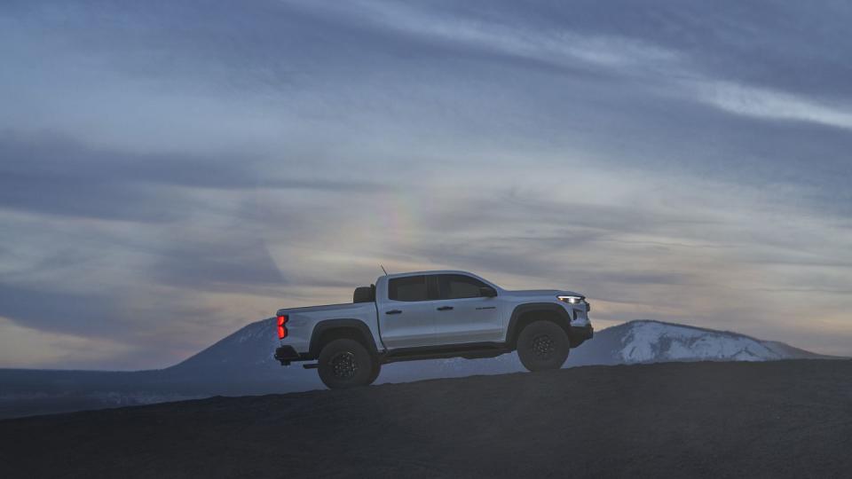 the colorado zr2 bison driving up a mountain ridge at an incline