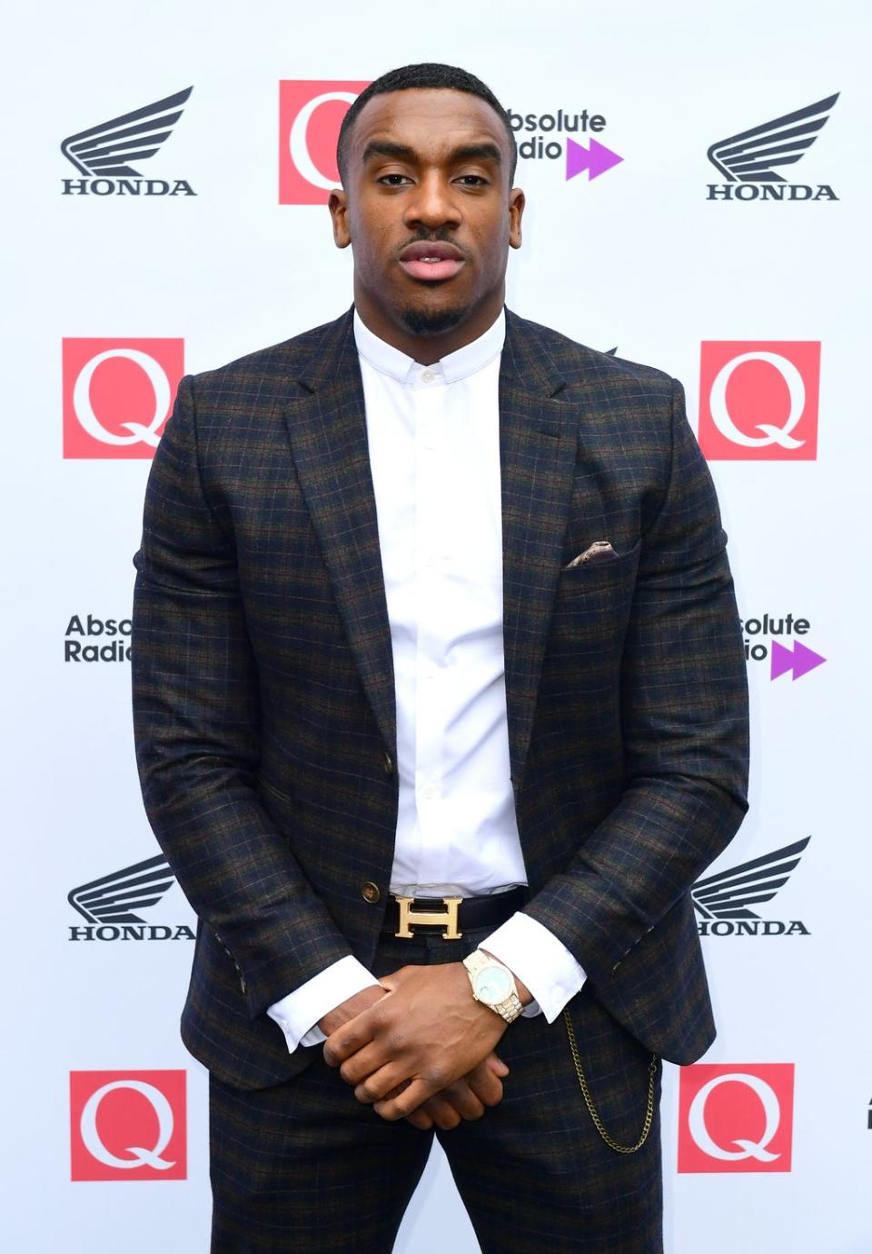 Bugzy Malone denies the charges (Ian West/PA) (PA Archive)