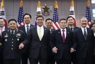 U.S. Defense Secretary Mark Esper, center left, poses with South Korean Defense Minister Jeong Kyeong-doo, center right, before their meeting Friday, Nov. 15, 2019, in Seoul, South Korea. (Kim Min-hee/Pool Photo via AP)