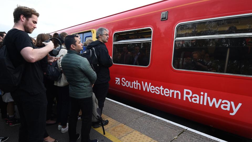 <p>Members of the RMT union on South Western Railway and Arriva Rail North mounted picket lines outside stations in the dispute over guards on trains.</p>