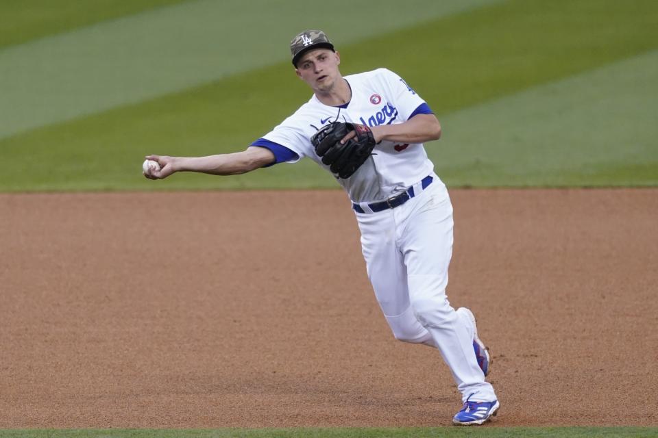 Dodgers shortstop Corey Seager throws to first during the third inning Saturday.