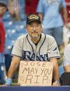 <p>A fan of the Tampa Bay Rays holds a sign honoring Miami Marlins pitcher Jose Fernandez before a game against the Boston Red Sox on September 25, 2016 at Tropicana Field in St. Petersburg, Florida. (Photo by Michael Ivins/Boston Red Sox/Getty Images) It's a tragedy that has gripped the sporting world, as Fernandez is universally regarded as one of the best pitchers in MLB. Rare is the loss of an athlete who is as good and as young as Fernandez. </p>