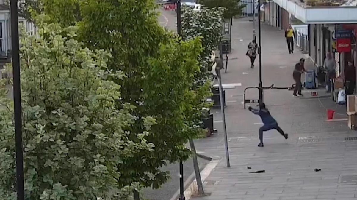 Anderson, 21, is seen on dramatic footage played to jurors firing as bystanders duck for cover (Met Police)