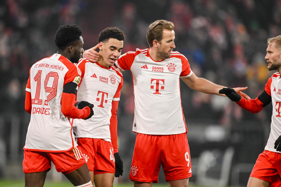 MUNICH, GERMANY - JANUARY 12: Jamal Musiala of Bayern Muenchen celebrates after scoring his team's second goal with teammates during the Bundesliga match between FC Bayern München and TSG Hoffenheim at Allianz Arena on January 12, 2024 in Munich, Germany. (Photo by Harry Langer/DeFodi Images via Getty Images)