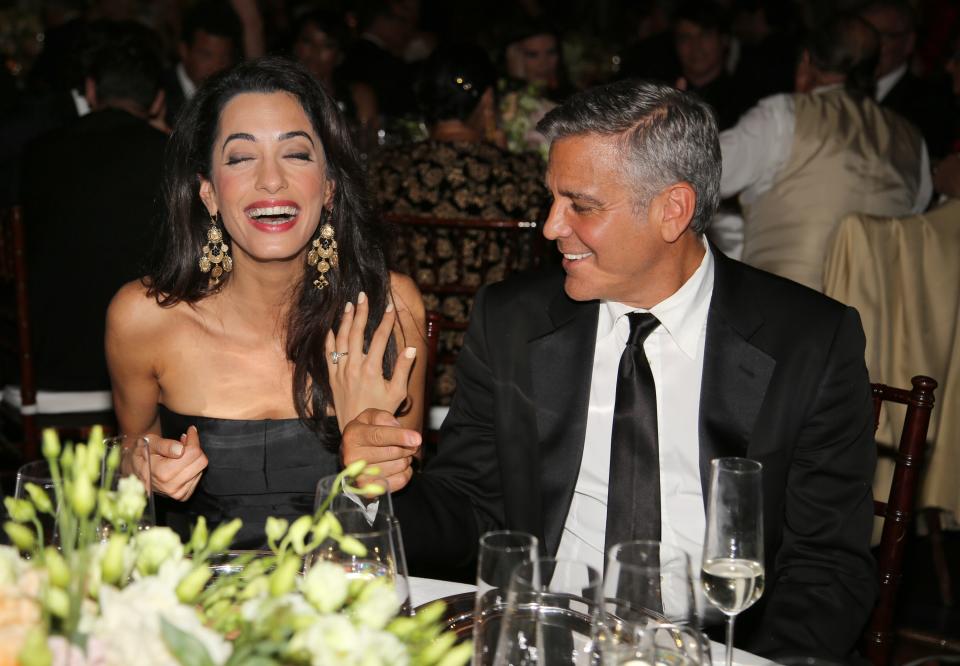 FLORENCE, ITALY - SEPTEMBER 06:  George Clooney (R) and fiance Amal Alamuddin attend the Celebrity Fight Night gala celebrating Celebrity Fight Night In Italy benefitting The Andrea Bocelli Foundation and The Muhammad Ali Parkinson Center on September 7, 2014 in Florence, Italy.  (Photo by Rachel Murray/Getty Images for Celebrity Fight Night)