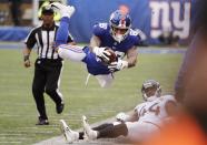 <p>New York Giants tight end Evan Engram (88) leaps over Myles Jack (44) during the second half of an NFL football game Sunday, Sept. 9, 2018, in East Rutherford, N.J. (AP Photo/Seth Wenig) </p>