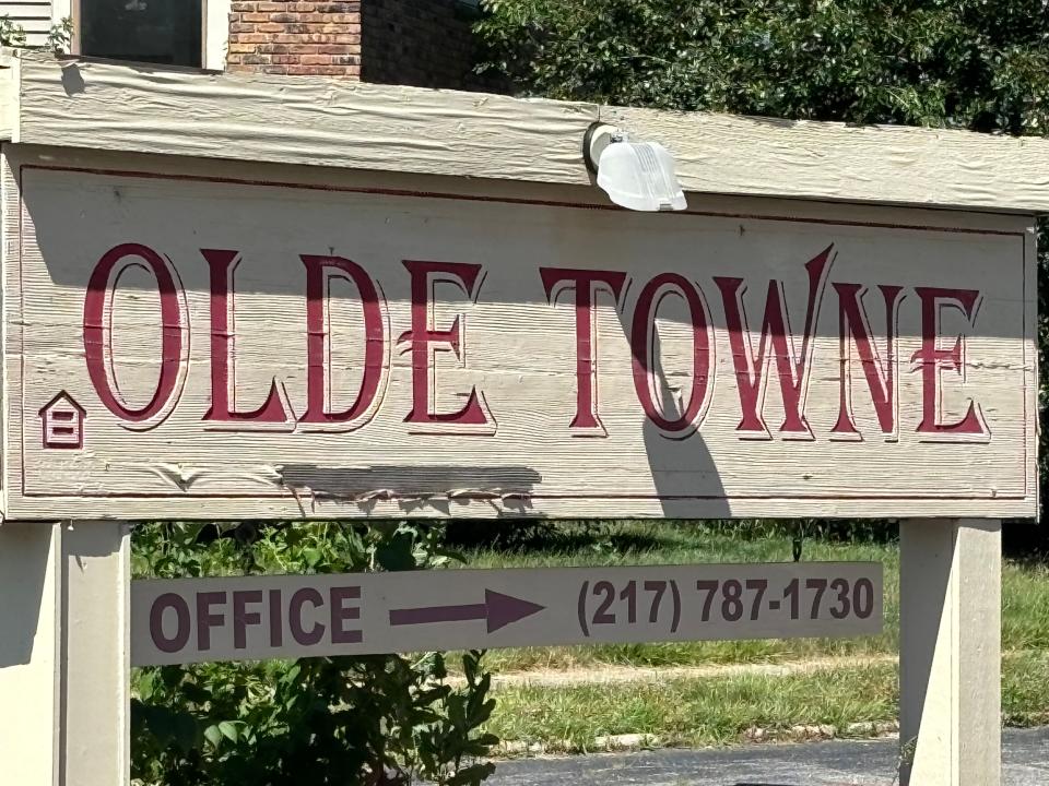 The Olde Towne Apartments sign on Bruns Lane on June 23, 2024. The 23 buildings that have 218 units are now vacant.