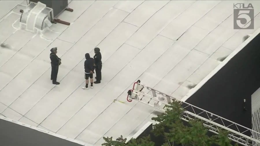 A burglary suspect was arrested by police on the roof of a business after he appeared to hide in a crate for hours to avoid detection. (Sky5)
