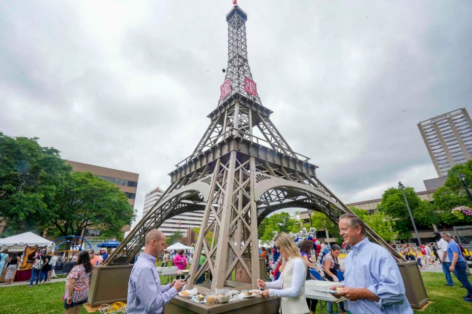 28. The 43-foot Eiffel Tower appears each year in Cathedral Square Park for the annual celebration of Bastille Day. The tower was never supposed to be permanent, or assembled and disassembled each year for its appearance at the festival.