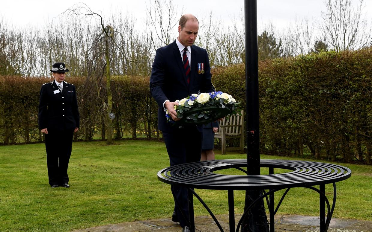 Britain's Prince William, lays a wreath at the Police memorial, at the National Arboretum in Alrewas - AFP or licensors