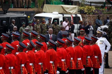 Kenya's President Uhuru Kenyatta inspects an Kenya Defence Forces (KDF) guard of honour during the country's Mashujaa Day (Heroes' Day) celebrations at the Uhuru park in Nairobi, Kenya, October 20, 2017. REUTERS/Baz Ratner