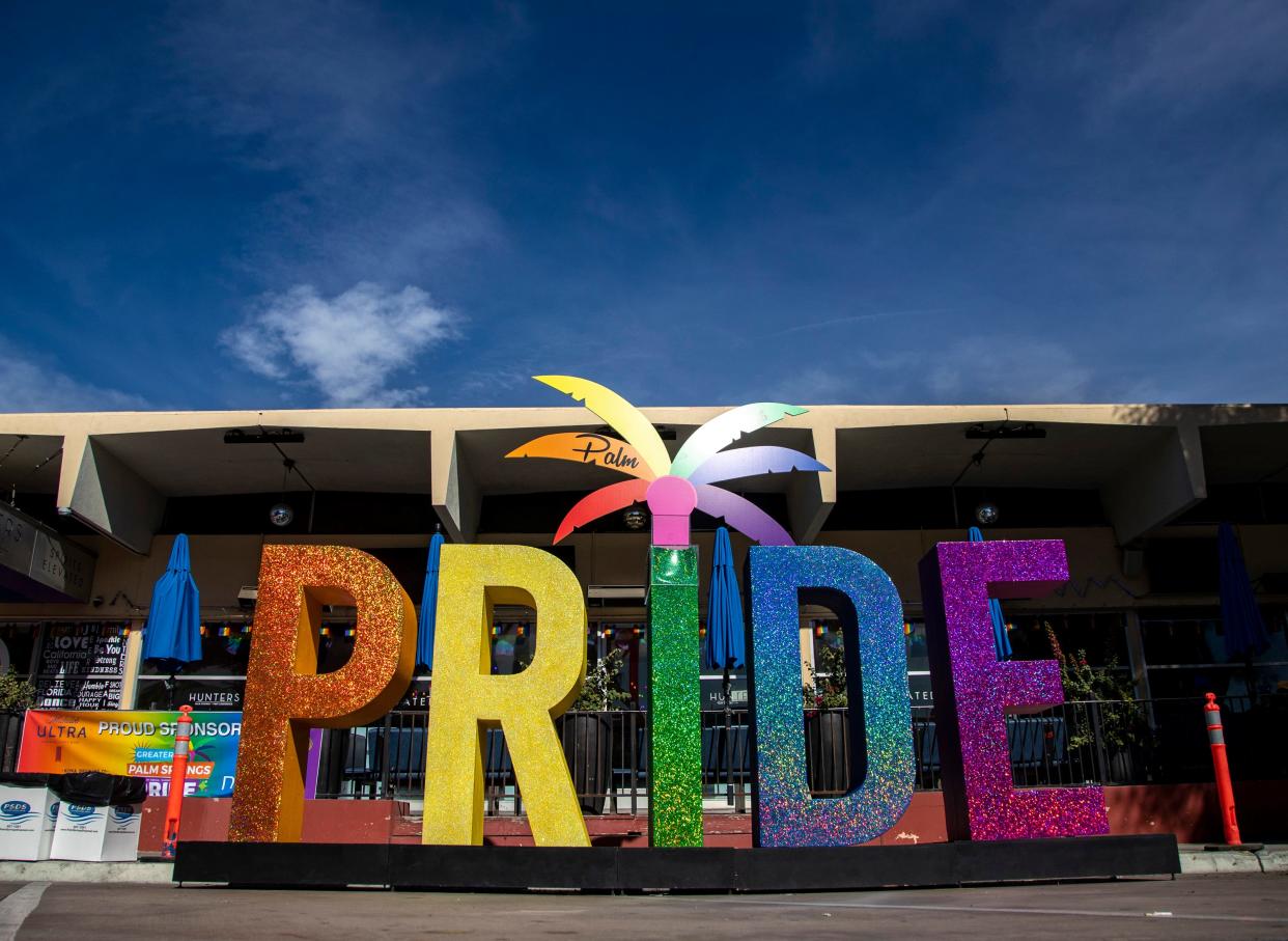 A large "PRIDE" sign is seen for festivalgoers to pose with on Arenas Road at the 36th annual Greater Palm Springs Pride Festival in Palm Springs, Calif., Saturday, Nov. 5, 2022. 