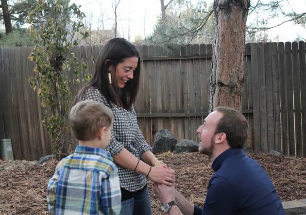 The author on Thanksgiving Day in 2014, two days after her stage 4 diagnosis, as her then-boyfriend Nick proposed. &#x00201c;My nephew photobombed the proposal,&#x00201d; she writes.