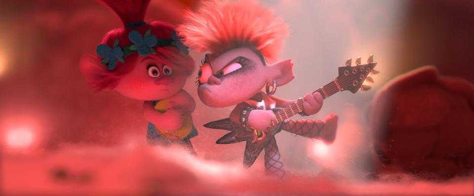 Poppy (voiced by Anna Kendrick, left) doesn't know what to make of metalhead Barb (Rachel Bloom) in the animated sequel "Trolls World Tour."