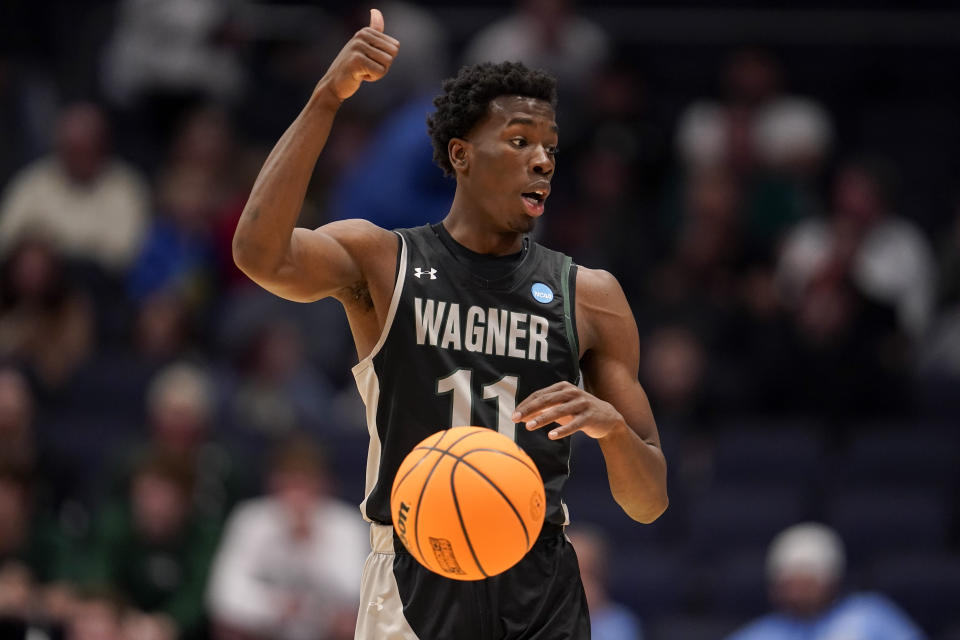 Wagner's Melvin Council Jr. gestures during the first half of the team's First Four college basketball game against Howard in the men's NCAA Tournament on Tuesday, March 19, 2024, in Dayton, Ohio. (AP Photo/Jeff Dean)