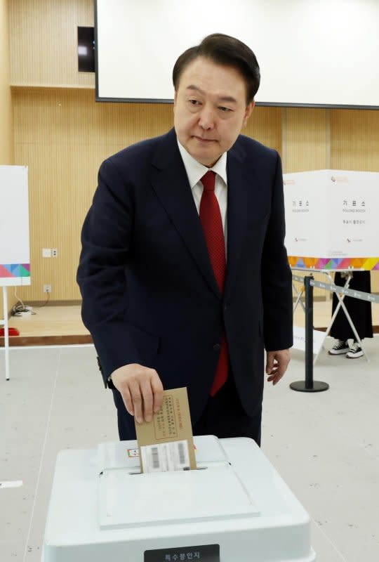 President Yoon Suk Yeol, whose domestic agenda has been hampered by opposition control of the National Assembly, cast his ballot Friday morning in Busan. Photo by Yonhap