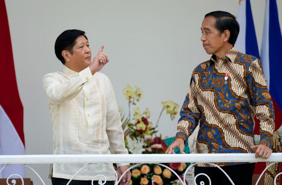 Philippine President Ferdinand Marcos Jr., left, talks with Indonesian President Joko Widodo during their meeting at the Presidential Palace in Bogor, Indonesia, Monday, Sept, 5, 2022. Philippine President Ferdinand Marcos, Jr. is in Indonesia for his three-day state visit. (AP Photo/Achmad Ibrahim, Pool)
