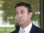 FILE - In this July 1, 2019 file photo U.S. Rep. Duncan Hunter leaves federal court after a motions hearing in San Diego. Former California Rep. Darrell Issa plans to run against indicted fellow GOP Congressman Hunter, The Associated Press has learned. (AP Photo/Denis Poroy,File)