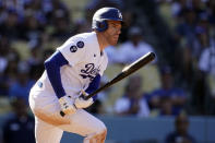 Los Angeles Dodgers' Freddie Freeman watches his RBI single during the seventh inning of the team's baseball game against the Colorado Rockies on Wednesday, Oct. 5, 2022, in Los Angeles. (AP Photo/Marcio Jose Sanchez)