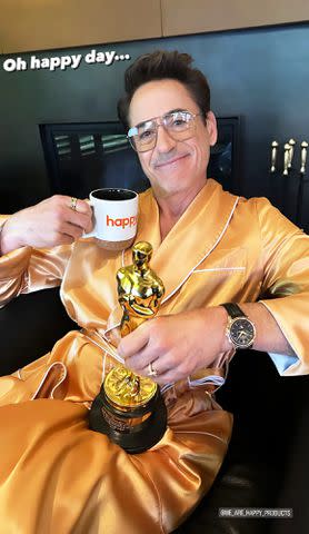 <p>Robert Downey Jr./Instagram</p> Robert Downey Jr. matches with his first Oscar win after Best Supporting Actor victory