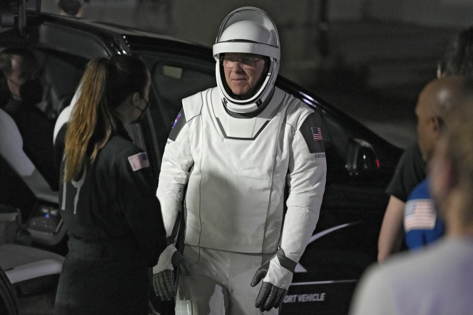 Commander Stephen Bowen talks to support members after leaving the Operations and Checkout building for a trip to Launch Pad 39-A, Wednesday, March 1, 2023, at the Kennedy Space Center in Cape Canaveral, Fla. Four astronauts are scheduled to liftoff early Thursday morning on a trip to the International Space Station. (AP Photo/John Raoux)