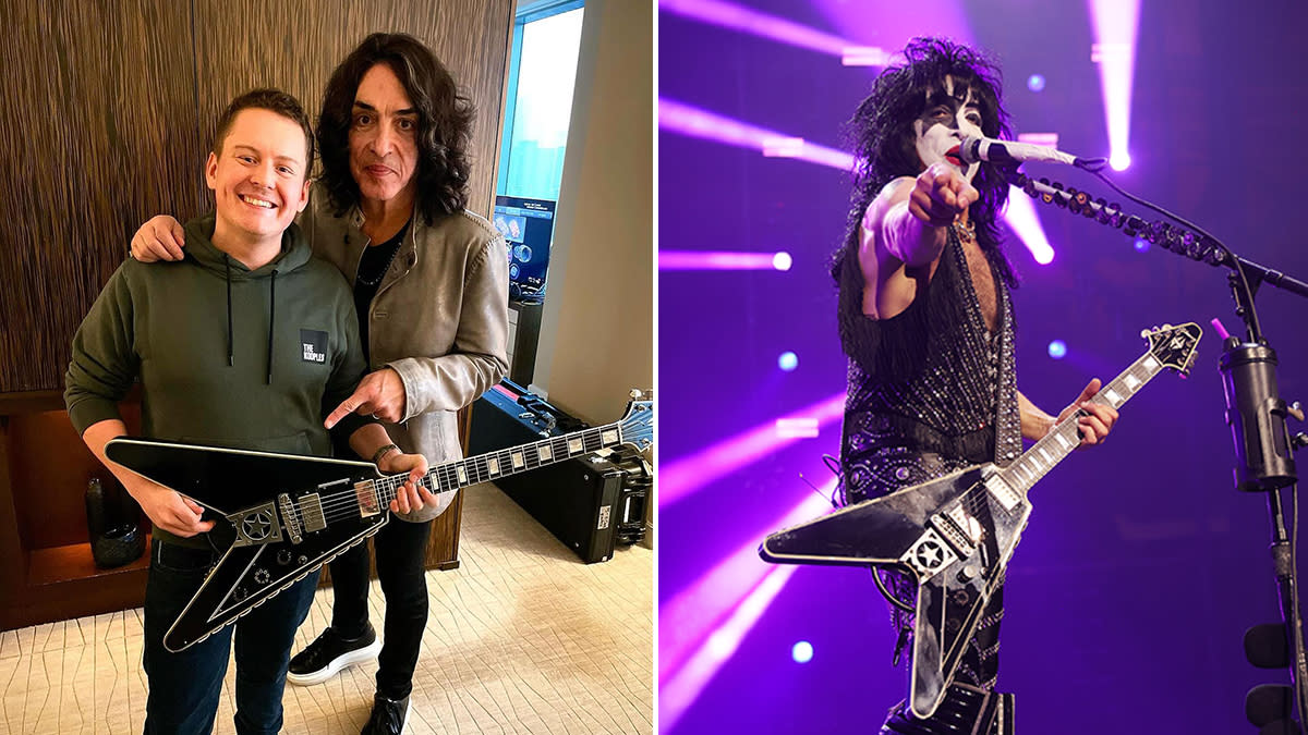  Paul Stanley with Matt's Guitar Shop holding his Gibson Flying V. 