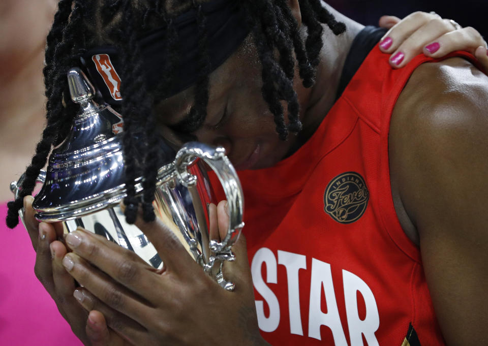 Indiana Fever's Erica Wheeler, of Team Wilson, cries as she holds the MVP trophy after winning the honor at the WNBA All-Star basketball game Saturday, July 27, 2019, in Las Vegas. (AP Photo/John Locher)